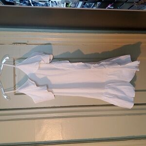 Thin strapped ruffled dress.